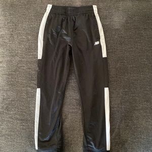 New Balance, black and white joggers, size Youth 8